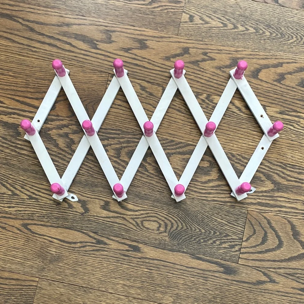 White and Pink Expandable Wall Rack